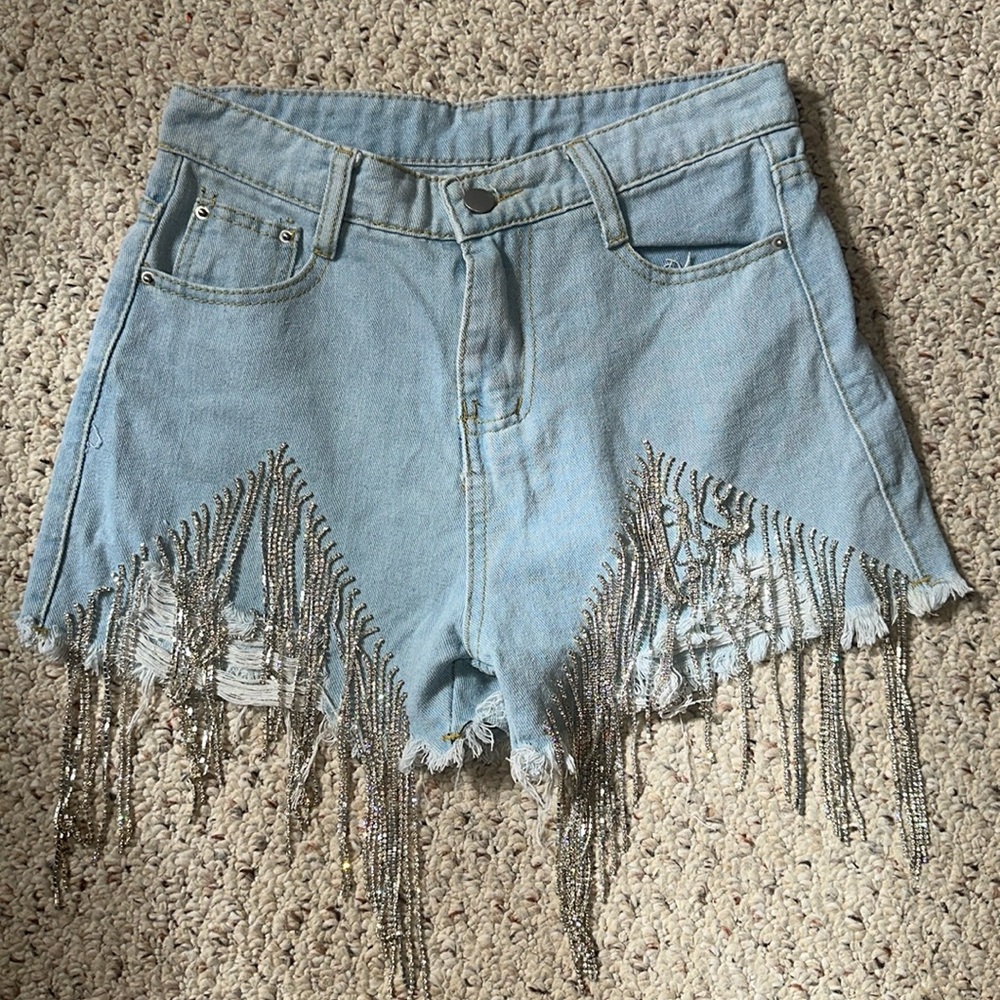 Denim shorts with rhinestone fringe